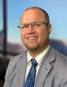 Headshot of Tyler Toline, CEO of Franciscan Healthcare